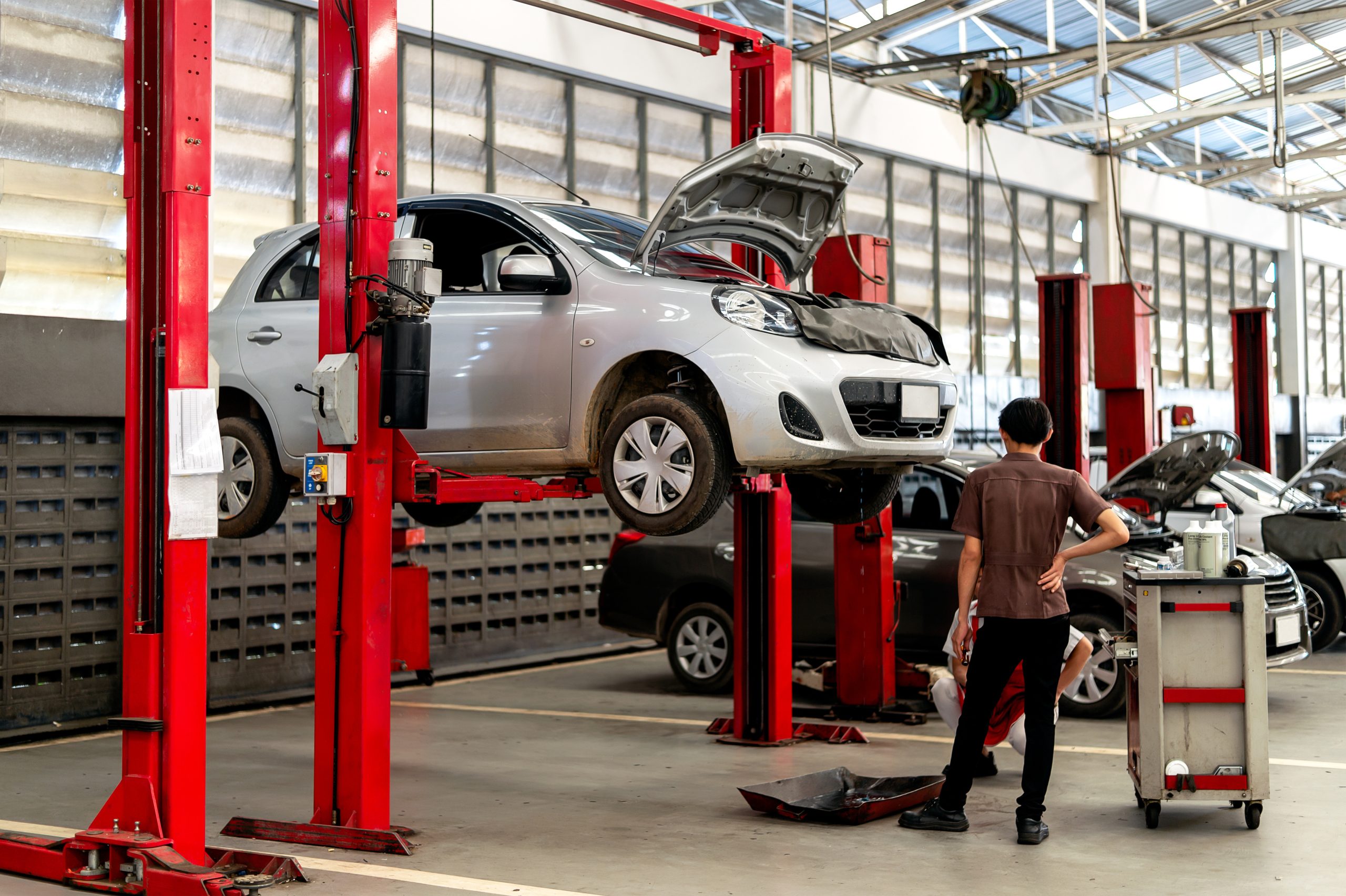 car in repair station and body shop with soft-focus and over light in the background