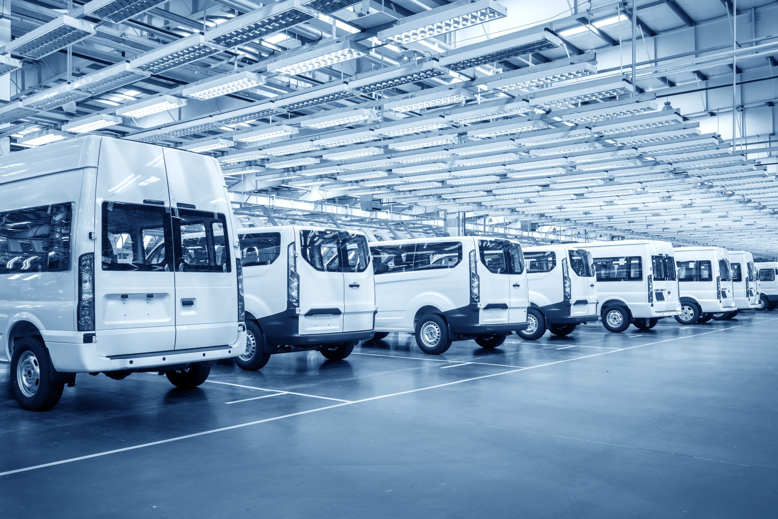 Automobile manufacturers, neatly arranged new cars are ready to leave the factory.